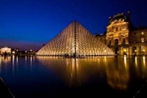 7737648-paris-france-apr-16-2010-reflection-of-louvre-pyramid-shines-at-dusk-during-the-summer-exhibition-in.jpg
